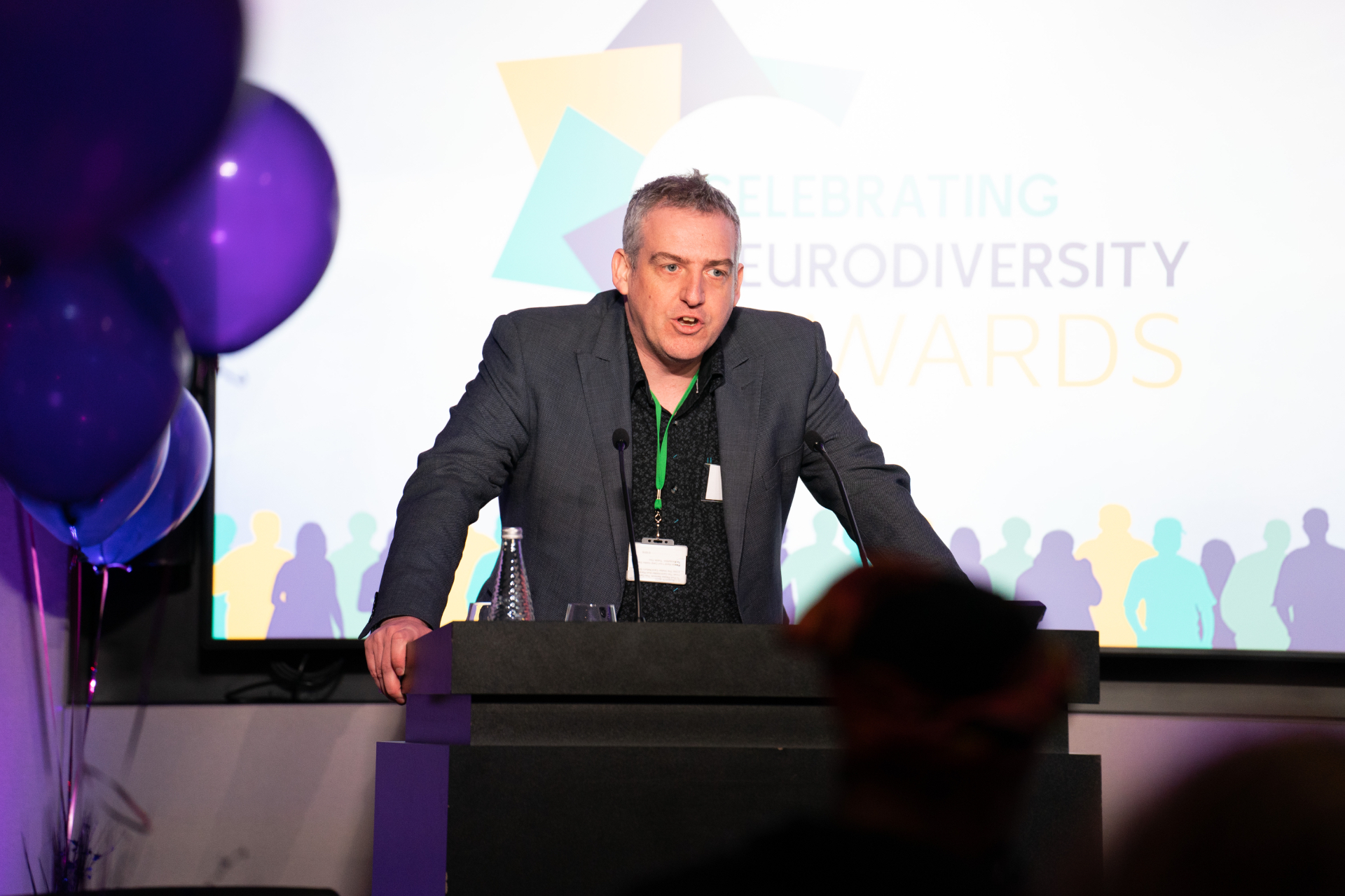 Executive neurodiversity consultant Wayne Kelly delivering a keynote at the Celebrating Neurodiversity Awards
